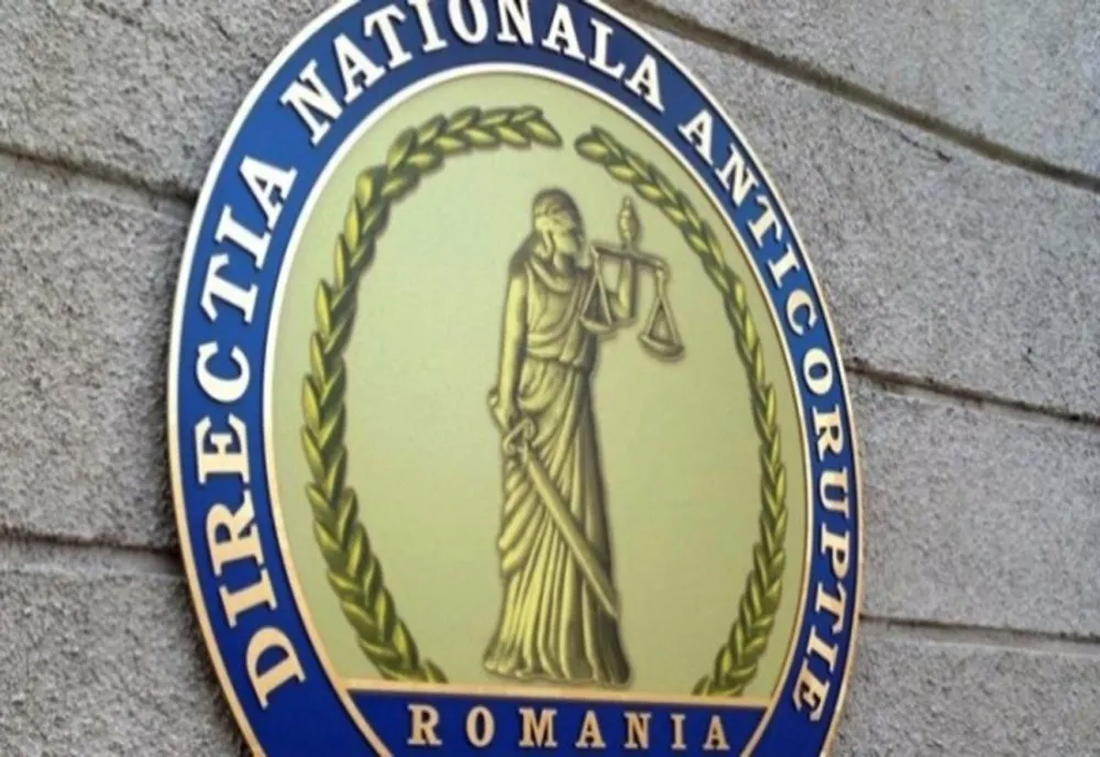 DNA: O femeie care a cerut mită 90.000 de euro unei persoane a fost reţinută