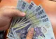 Scandal pe salariul minim - Surse: Cei 200 de lei scutiți de taxe dispar, de anul viitor